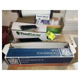 FOOD SAVER FM2000, WITH BAGS, AND FOOD SERVICE FIL