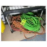 GROUP OF ELECTRICAL CORDS, ORANGE AND GREEN