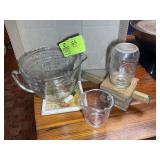 PAIR OF ANCHOR HOCKING MEASURING CUPS AND HOMEMADE