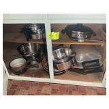 CABINET WITH ASSORTED POTS, PANS, STRAINERS