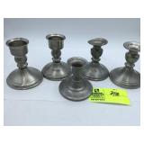 Group of 5 pewter candlestick holders
