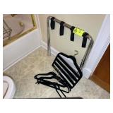 GROUP INCLUDING CLOTHES DRYING RACK AND LUGGAGE RA