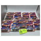 GROUP OF HOT WHEELS PRO RACING 1997 1/64 SCALE DIE