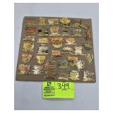 GROUP OF NASCAR THEMED PINS