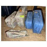 GROUP OF FLORAL AND BLUE LUGGAGE