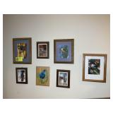 GROUP OF DECORATIVE ITEMS ON WALL IN MASTER BATH,