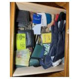 DRAWER WITH MISC ITEMS, OLD WALLETS, TRAVEL ALARM