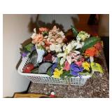 GROUP OF ARTIFICIAL FLOWERS AND CANDLES