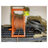 EXTENSION CORD ON REEL AND BATTERY CHARGER