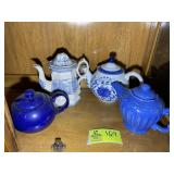 GROUP OF BLUE AND WHITE TEAPOTS, SOME WITH DAMAGE