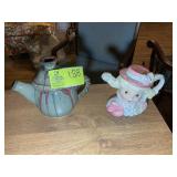 A PAIR OF CERAMIC TEAPOTS