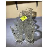 GROUP OF CLEAR GLASS WATER GOBLETS AND PITCHER