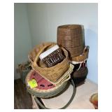 A GROUP OF WICKER BASKETS