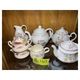 GROUP OF DECORATIVE TEAPOTS, CREAM AND SUGAR, ETC