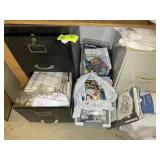 GROUP OF CROSSTITCH PATTERNS BELOW DESK