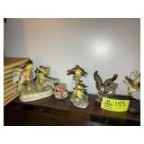 A GROUP OF DECORATIVE BIRD FIGURINES; ONE WITH DAM