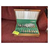 A WOODEN BOX CONTAINING SILVER PLATED ROGERS BROTH