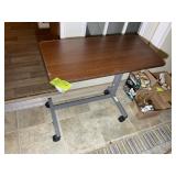 A ROLLING HOSPITAL TABLE, 30IN X 15IN