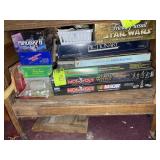 A GROUP OF BOARD GAMES, MONOPOLY, PICTIONARY, TRIV
