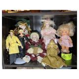 TOP SHELF OF VINTAGE DOLLS