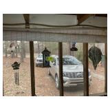 GROUP OF BIRD FEEDERS AND WIND CHIMES