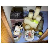 GROUP INCLUDING CANDLES AND DECORATIVE FIGURINES A