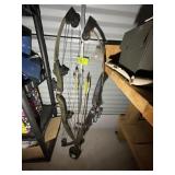 PAIR OF BEAR SURE HIT COMPOUND BOWS WITH ARROWS