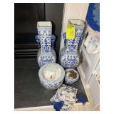GROUP OF BLUE AND WHITE DECORATIVE VASES AND FLOWE