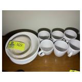 GROUP OF CORRAL BOWLS PLATES AND MUGS