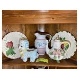 TOP SHELF OF CORNER CABINET INCLUDING DECORATIVE P