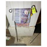 GROUP OF YARD FLAGS AND FLAG HOLDERS