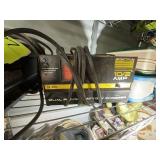 GROUP INCLUDING TIRE INFLATOR BATTERY CHARGER MAIN