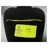 APPEARS TO BE MARKED 14K YELLOW GOLD HERRINGBONE C