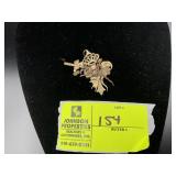 APPEARS TO BE MARKED 14K YELLOW GOLD CHARMS CONNEC