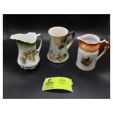 GROUP OF SMALL WATER PITCHERS, ONE FLORAL ONE GRAP