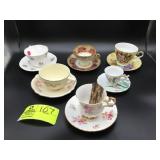 GROUP OF SIX MISCELLANEOUS TEA CUPS WITH SAUCERS