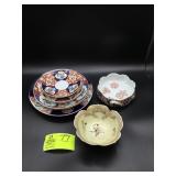 LARGE GROUP OF ORIENTAL THEMED PLATES AND BOWLS