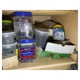 BOTTOM SHELF OF CABINET INCLUDING MISCELLANEOUS FA