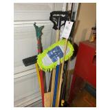 BUCKET WITH MISCELLANEOUS BROOM MOP HANDLES SPRAY