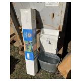 SUN AND SKY SUN SHELTER, METAL BUCKET AND SMALL CA