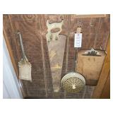 CONTENTS ON WALL TO LEFT OF OFFICE BED WARMER HAND