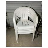 GROUP OF FOUR WHITE RESIN PATIO CHAIRS