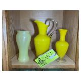 GROUP OF THREE YELLOW GLASS DECORATIVE ITEMS VASES