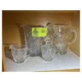 CONTENTS BOTTOM RIGHT OF CABINET TO GLASS WATER PI