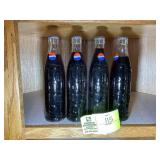 GROUP OF FOUR VINTAGE UNOPENED PEPSI BOTTLES, RAIS