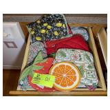 DRAWER WITH MISCELLANEOUS POT HOLDERS, OVEN MITTS,