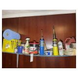 SHELF INCLUDING RAGS, TORCHES, ETC