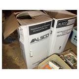 TWO PARTIAL ROLLS OF ALSCO ALUMINUM TRIM COIL TEXT