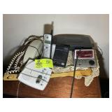 CONTENTS ON TOP OF NIGHT STAND PHONES, ANSWERING M