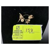 APPEARS TO BE 14K GOLD MISC OCEAN THEMED CHARMS, A